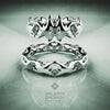 White Gold ring with intricate design on a reflective surface, featuring the Valeriy Gromov brand
