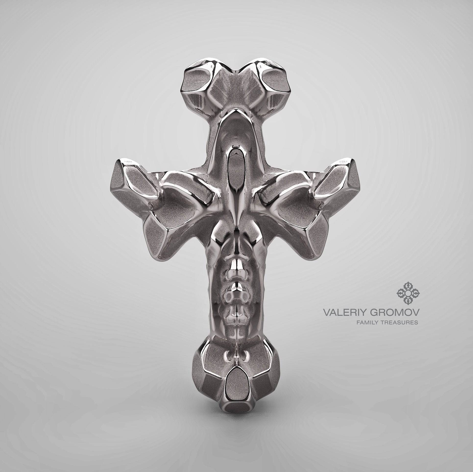 Grey gold cross pendant on a gray background with 'Valeriy Gromov Family Treasures' branding.